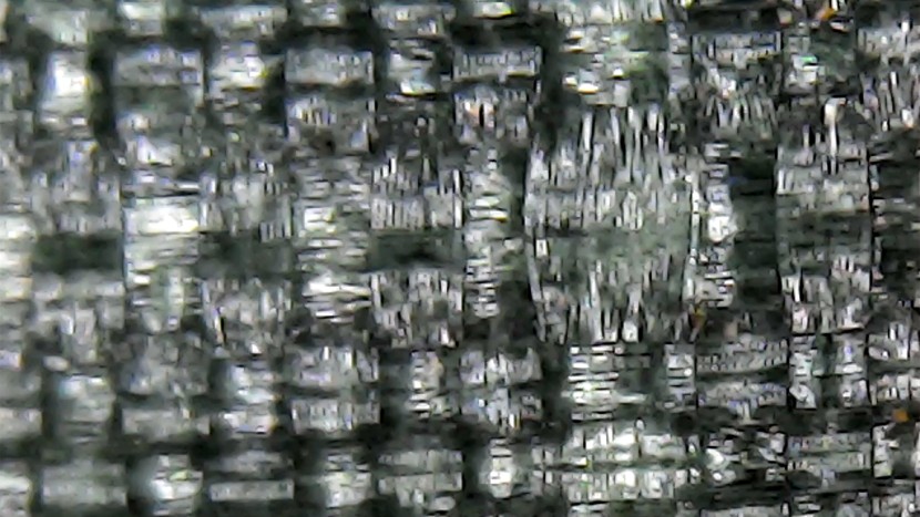 up close using our microscope, we can view the extremely tight weave...