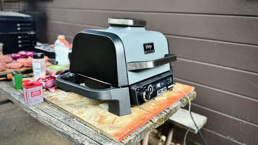 ninja woodfire outdoor grill &amp; smoker with thermometer - the ninja design is fully enclosed and powered by electricity...