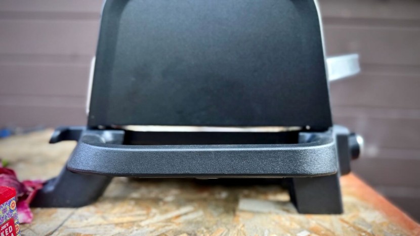 ninja woodfire outdoor grill &amp; smoker with thermometer - beefy handles located on each side of the tabletop grill help...