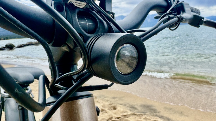 the compact headlight nestles into the maze of cables in the front...