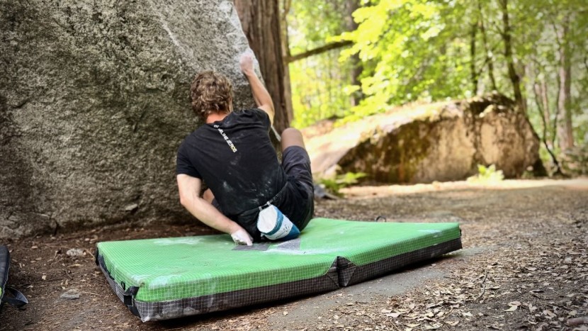 bouldering crash pad - this sandwiched configuration features open cell foam surrounded by...