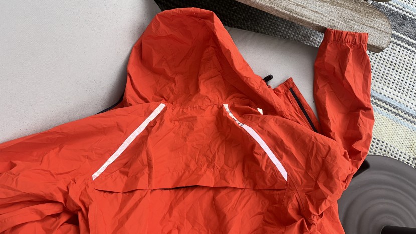 running jacket - reflective strips provide visibility in high traffic areas, a key...