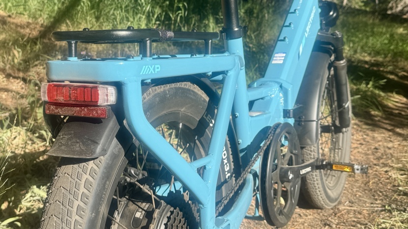 the integrated tail light features a working brake light and turn...