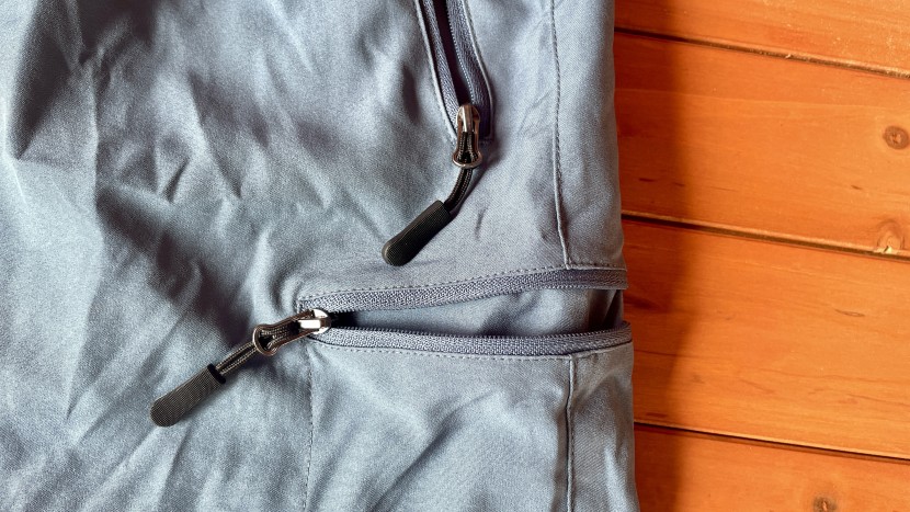 the zipper pulls on the santiny are rather bulky and long.