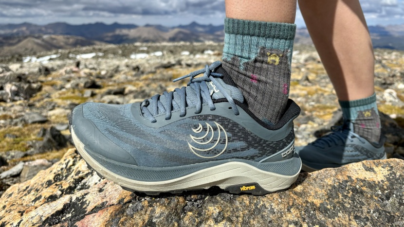 trail running shoes womens - though a taller stack height, the wide base and roomy toe box allow...