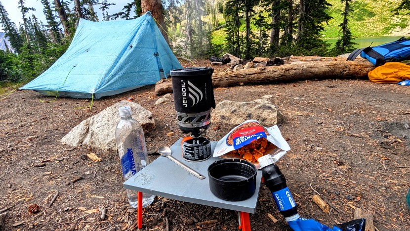 camping table - the crazy creek folds up into a six-inch block and weighs just a...