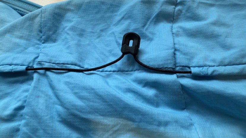 adjustable cinch straps on the back of the hood let you personalize...