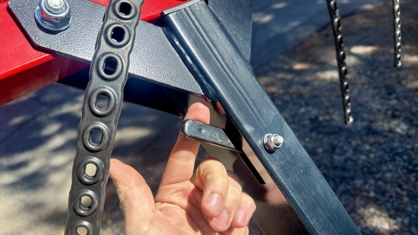 the tilt-release handle is positioned high on the mast and...