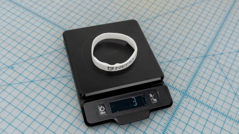 the clever velcro straps adds in 0.1 ounce / 3 grams.