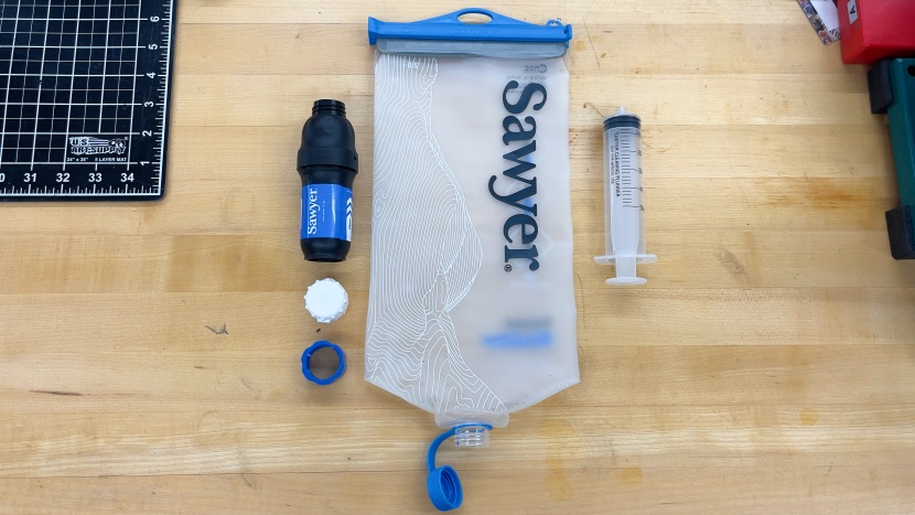 the bag, filter, caps, and flush syringe.
