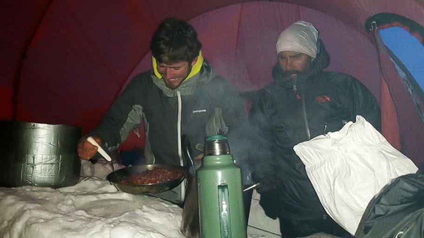 msr whisperlite universal - one of our gear testers heating up some sun-dried tomatoes to...