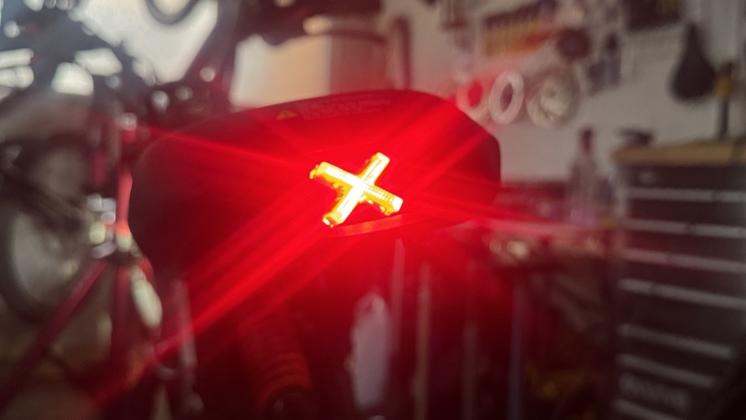 while the tail light is adequately bright and viewable from a side...