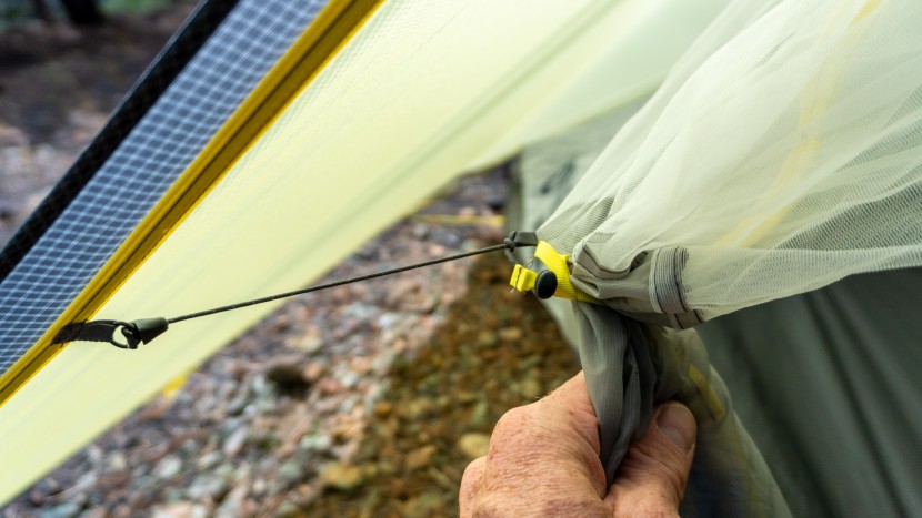 the inner mesh tieback also has a simple hook and clip to pull the...