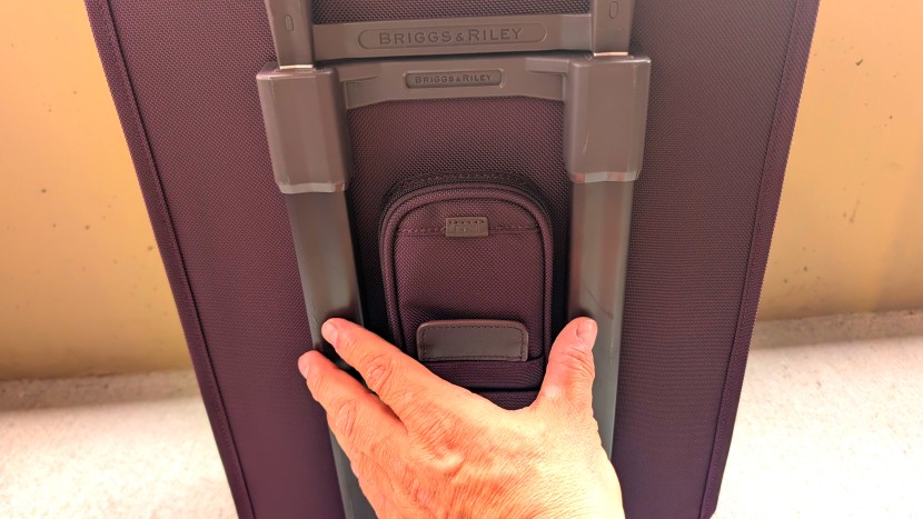 briggs &amp; riley baseline essential spinner - placing the trolley-handle housing on the exterior of the bag...