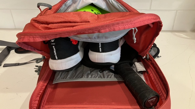 this packs main compartment has plenty of space for shoes and more...