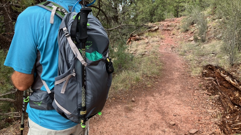 osprey sportlite 25 - the trekking pole tips slide into a small nylon loop at the pack&#039;s...