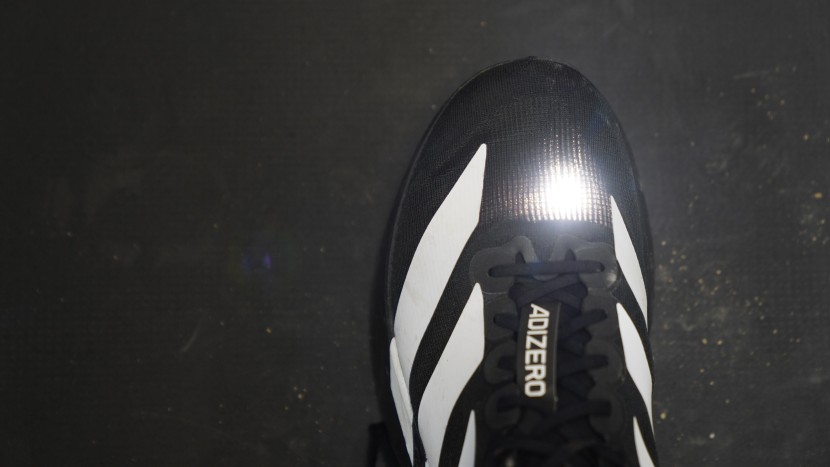 adidas adizero evo sl - a phone flashlight easily shines through the upper of the evo...