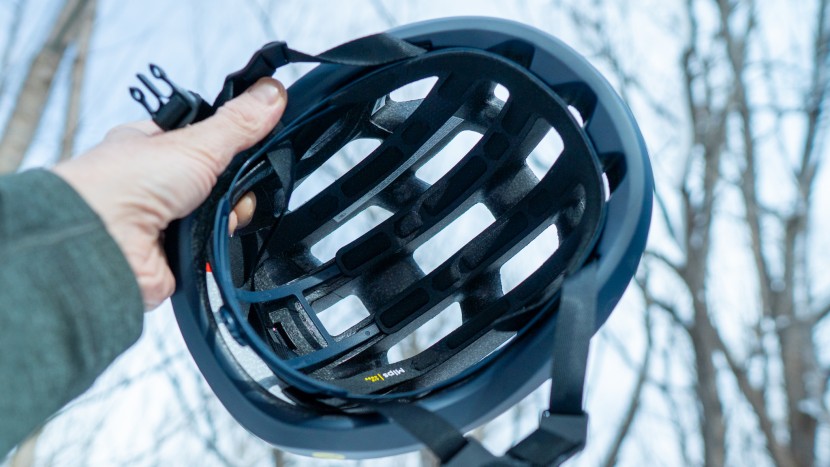 viewing the helmet in front of a light source reveals how well air...