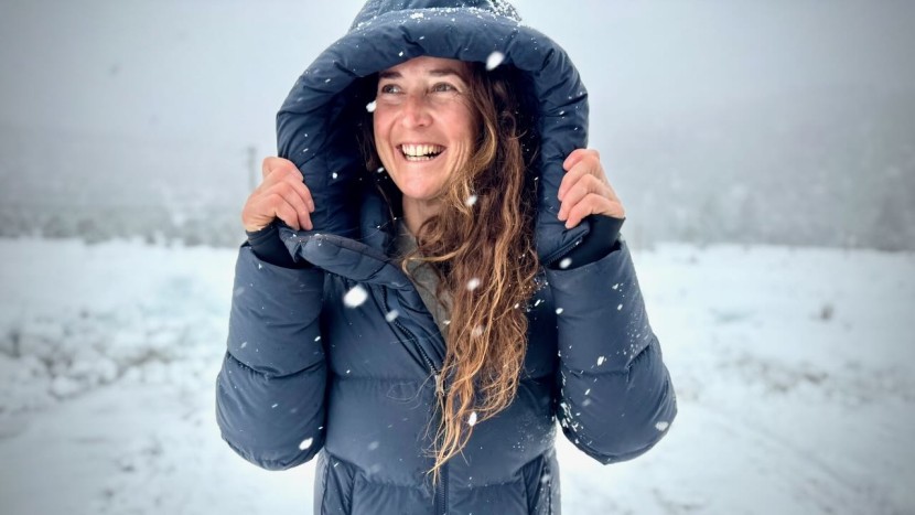 the oversized hood, high collar, wrist gaiters, and long hemline...